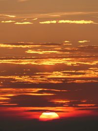 Scenic view of dramatic sky during sunset