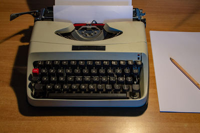 High angle view of telephone on table