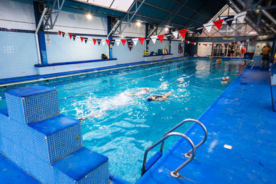 High angle view of swimming in pool