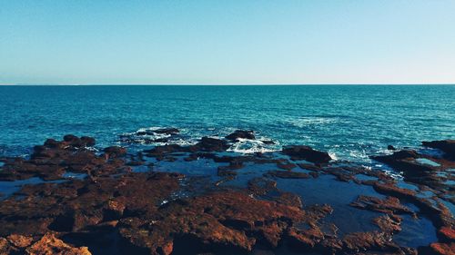 Scenic view of sea against clear sky