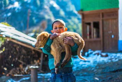 Boy standing outdoors