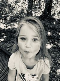 Portrait of girl standing outdoors