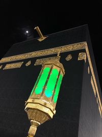 Low angle view of illuminated building at night