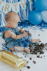 High angle view of cute girl playing with toy