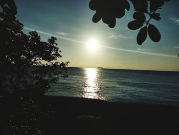 Scenic view of sea against sky at sunset