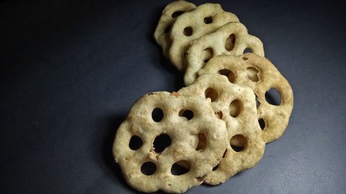 Close-up of cookies against black background