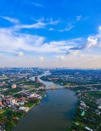 High angle view of river amidst buildings in city