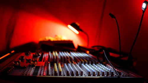 Close-up of illuminated musical equipment