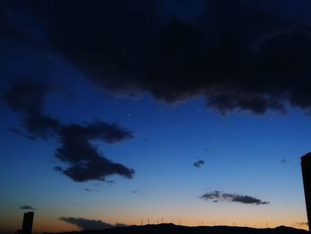 Low angle view of dramatic sky at sunset