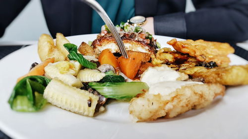 Close-up of served food in plate