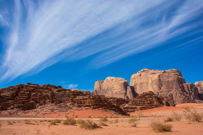 Rock formations against blue sky