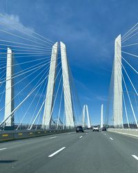 Low angle view of bridge against sky in city