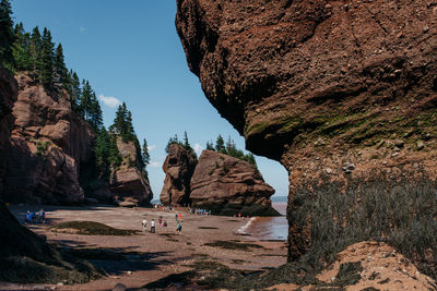 Scenic view of rock formations on beach