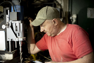 Side view of man working