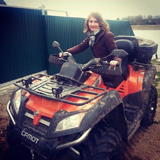 lifestyles, person, casual clothing, young adult, leisure activity, full length, mode of transport, transportation, sitting, young women, front view, portrait, looking at camera, land vehicle, smiling, standing, happiness