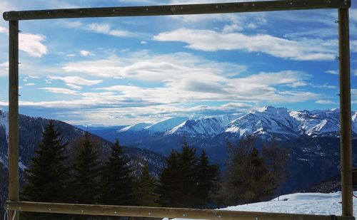 Scenic view of snow covered mountains