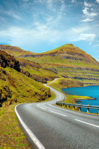 Scenic view of mountain road against sky