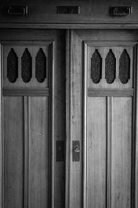 Close-up of closed door of house