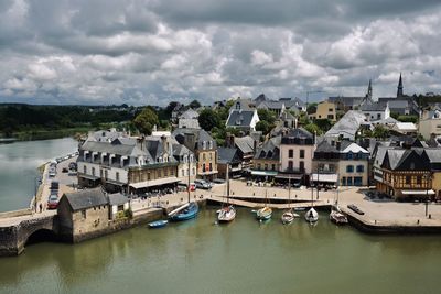 High angle view of river by buildings against sky in saint-goustan