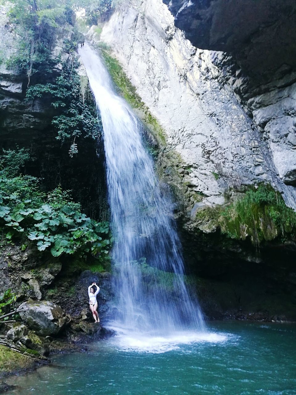 waterfall, motion, water, long exposure, flowing water, nature, beauty in nature, scenics, flowing, day, power in nature, outdoors, tranquil scene, waterfront, tranquility, rock formation, non-urban scene, mountain, rocky mountains