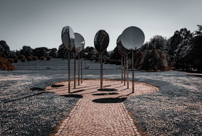 Street lights against clear sky