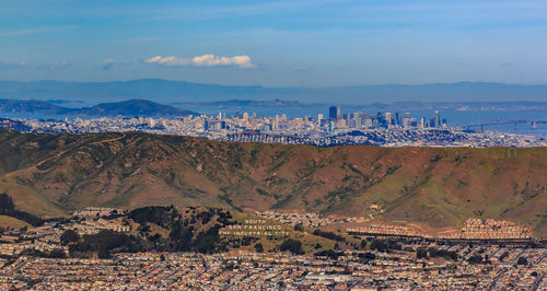 Aerial view of townscape against sky