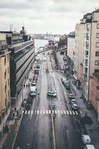 High angle view of cars on street in city