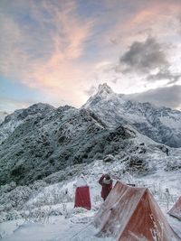 Scenic view of snowcapped mountains against sky