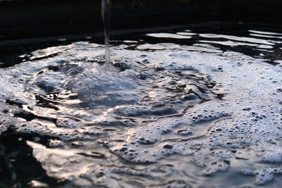 High angle view of water splashing on shore