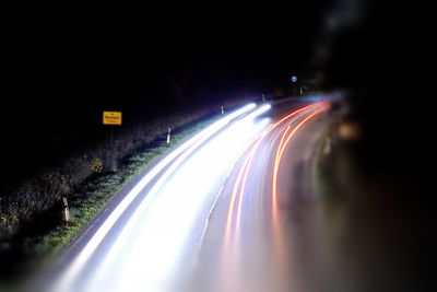 Light trails on road at night