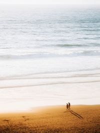 People walking at beach