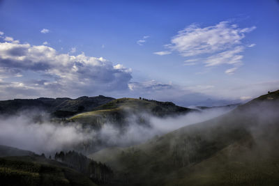 Panoramic view of volcanic mountain against sky