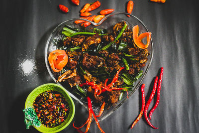 High angle view of chili peppers on table
