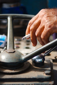 Close-up of man working in bus