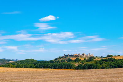 Landscape with skyline of little town of monteriggioni, tuscany, along via francigena