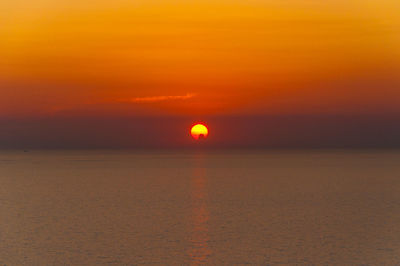 Fiery sky as the sunset over the sea, zakynthos island, greece