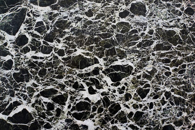 Full frame shot of rocks in sea