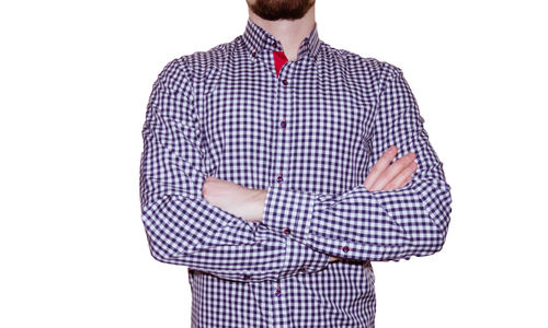 Midsection of man standing against white background