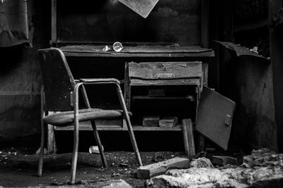 Empty chairs in abandoned room