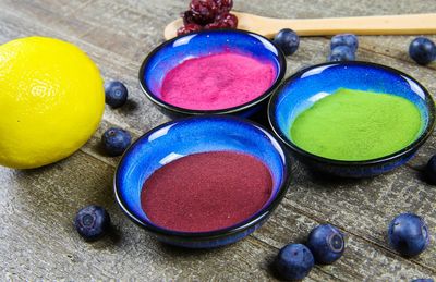 High angle view of multi colored candies on table