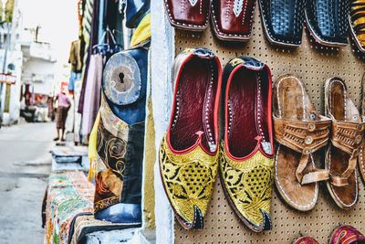 Close-up of shoes hanging on boat