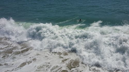 View of waves splashing on beach