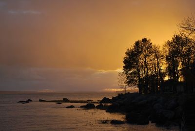 Scenic view of sea at sunset