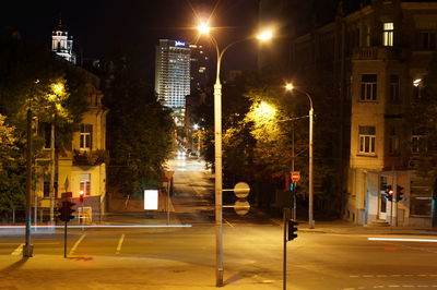 Illuminated street at night