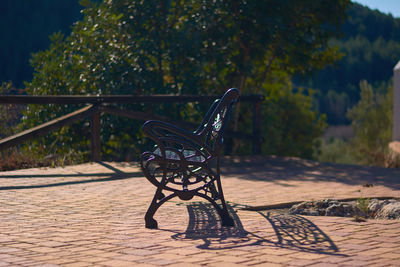 Empty bench in park