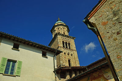 Low angle view of historic building against clear blue sky