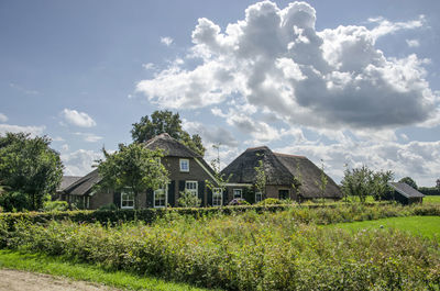 Farmhouse under a dramatic sky