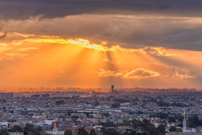 High angle view of townscape against sky during sunset