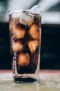 Close-up of ice cream in glass on table