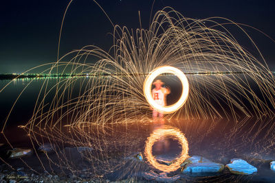 Light painting against clear sky at night